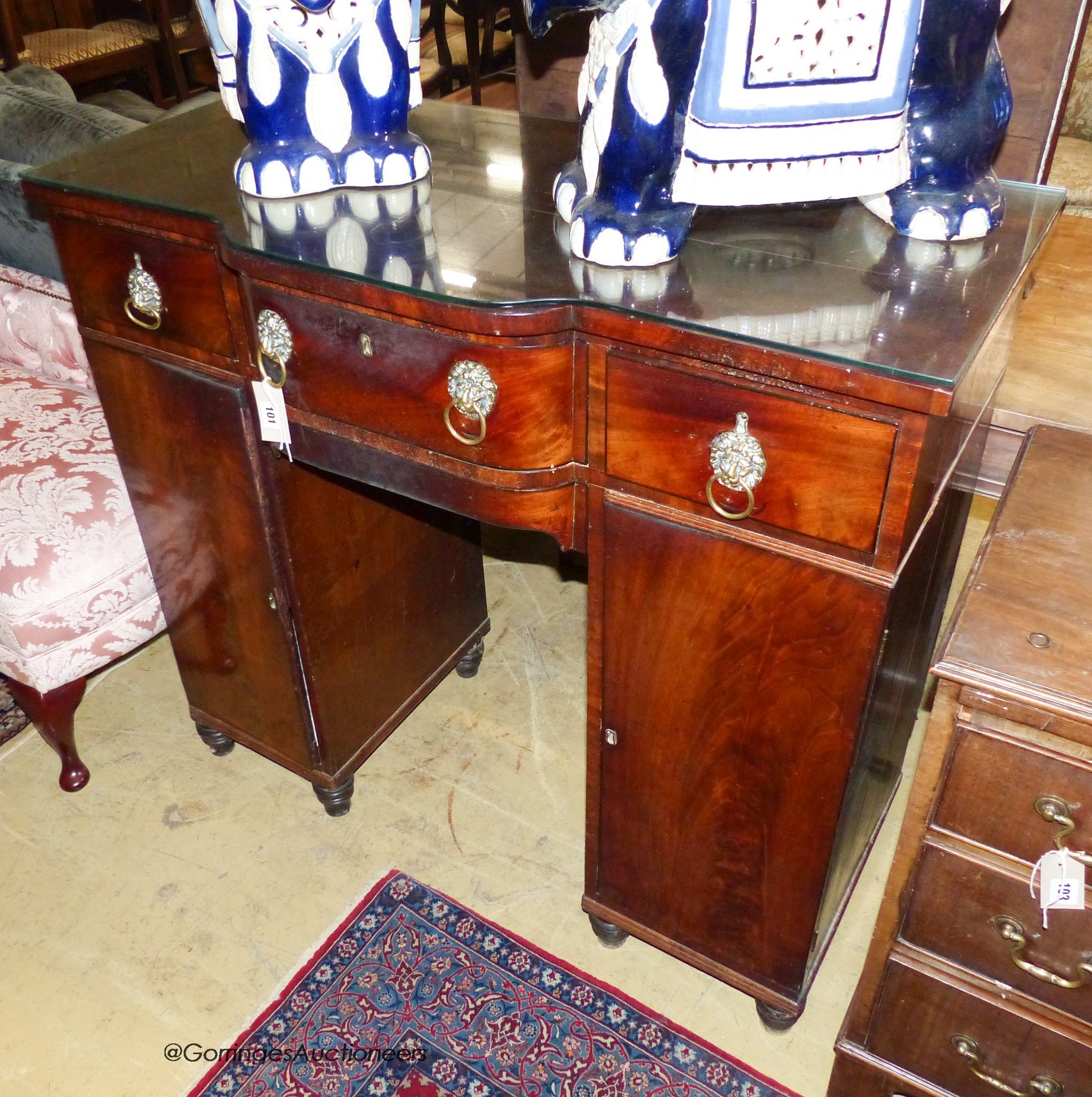 A Regency mahogany pedestal sideboard, length 107cm, depth 46cm, height 99cm